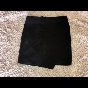 black cutout mini skirt